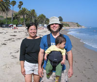 Dave, Florabell, and little Nicolas who's checking the surf